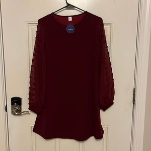 Never worn before, burgundy short to mid-length dress, size small